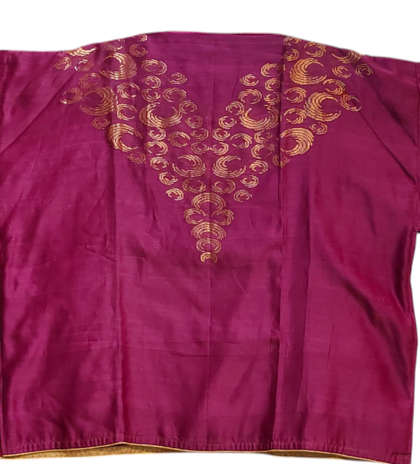 Purple fabric with gold embroidery on a white background