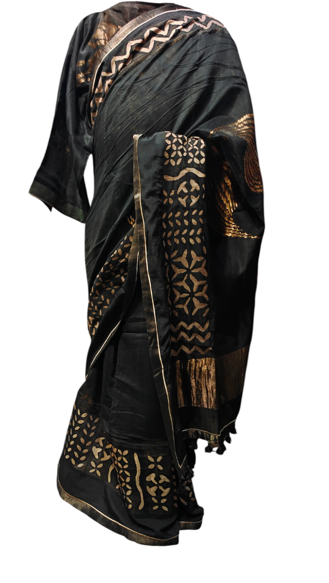 Black saree with gold patterns on a white background