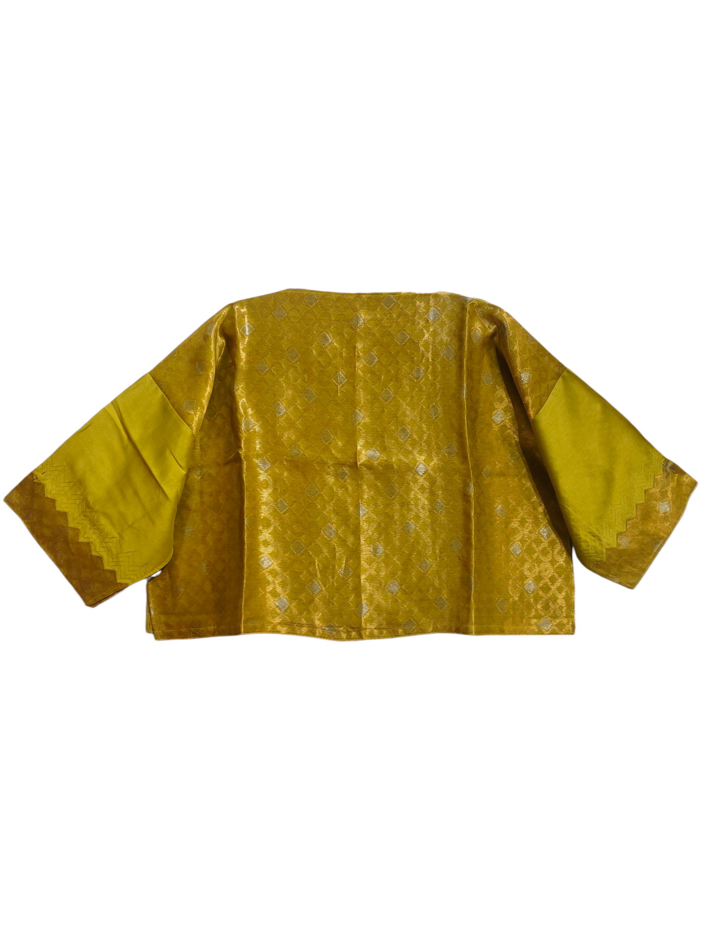 Yellow patterned blouse on a white background