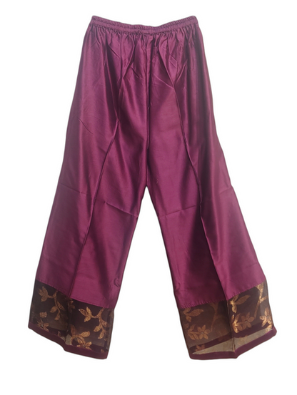 Purple plazzo with gold trim on a white background