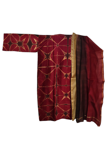 Red garment with geometric pattern on a white background