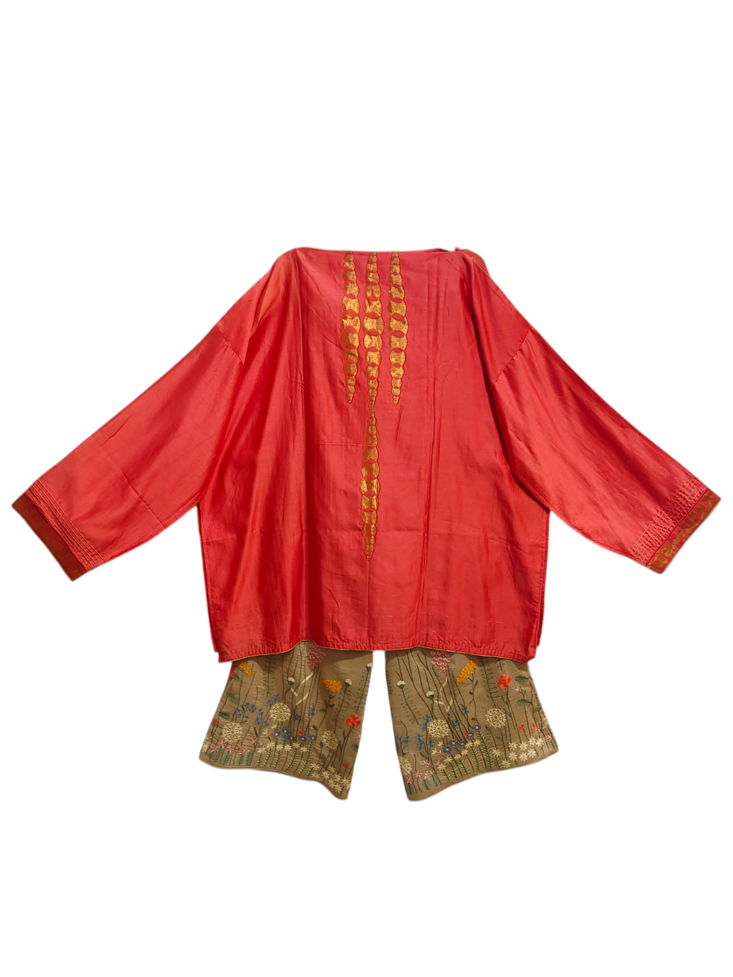 Pink traditional tunic with gold embroidery on a white background