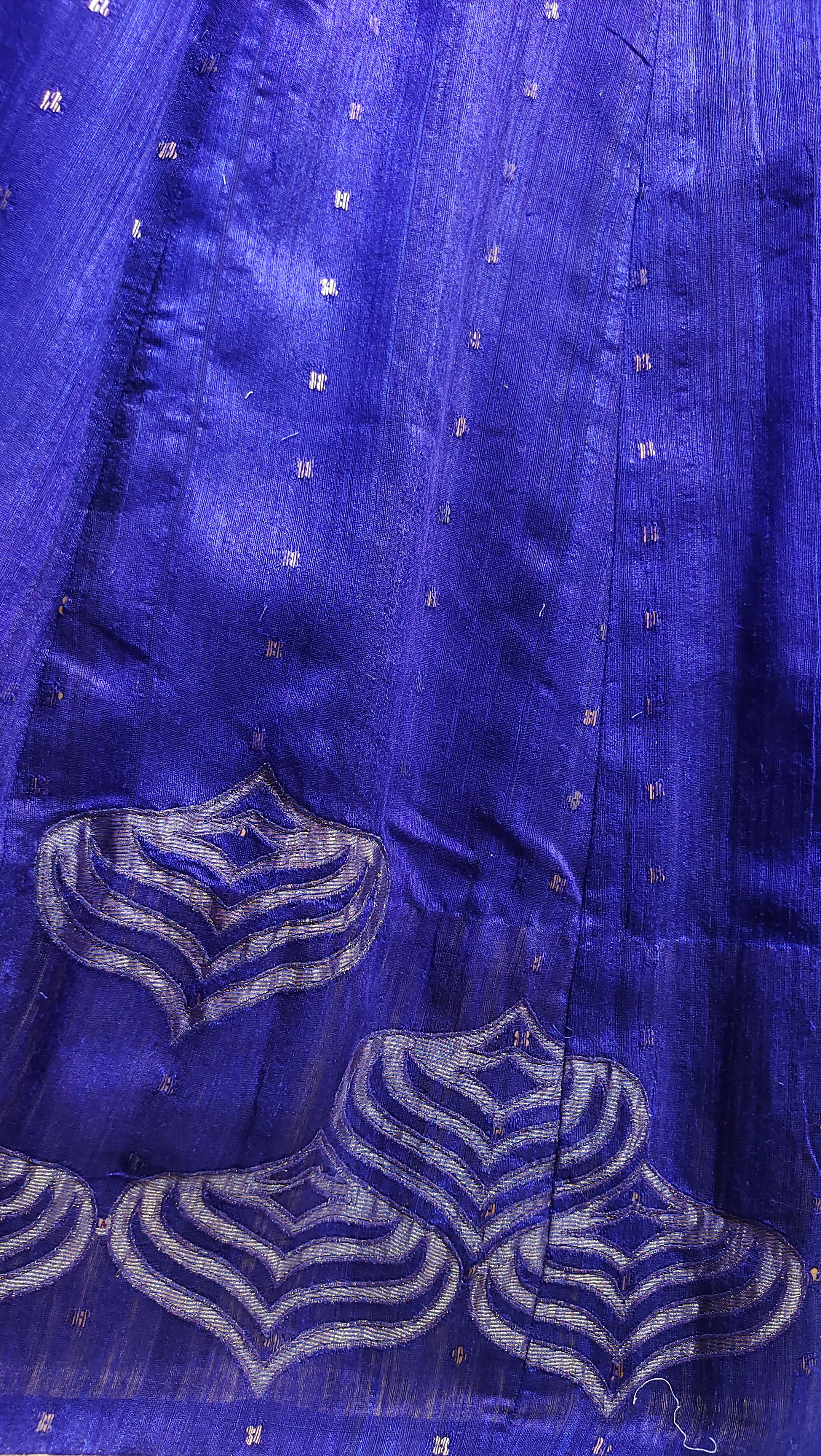 Close-up of a blue fabric with intricate patterns