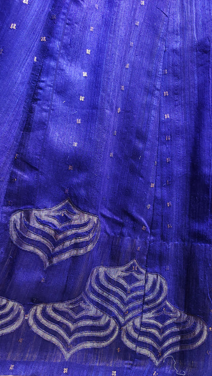 Close-up of a blue fabric with intricate patterns
