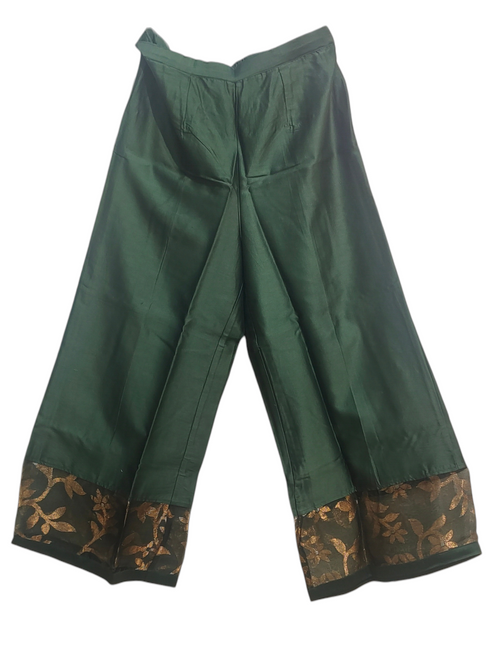 Green plazzo part with floral embroidery  on a white background