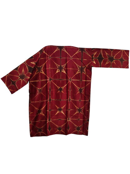 Red garment with geometric pattern on a white background