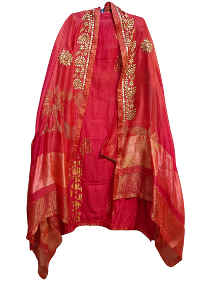 Pink suit gold embroidered on a white background