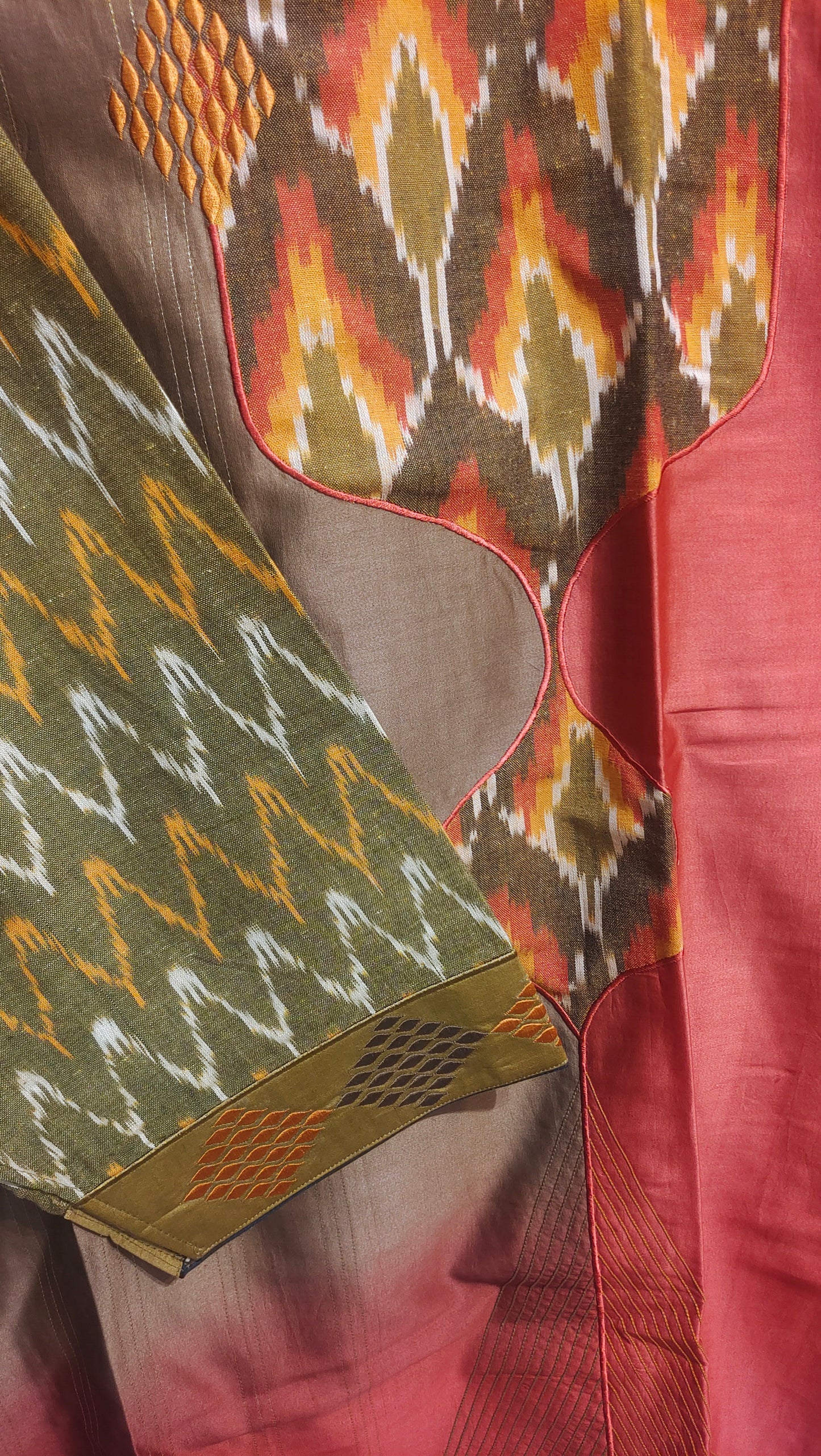 Close-up of patterned fabric with geometric design on a textured surface