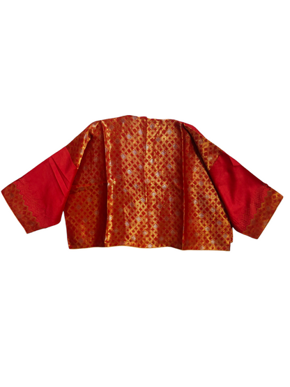 Traditional blouse with red sleeves and gold patterned on a white background