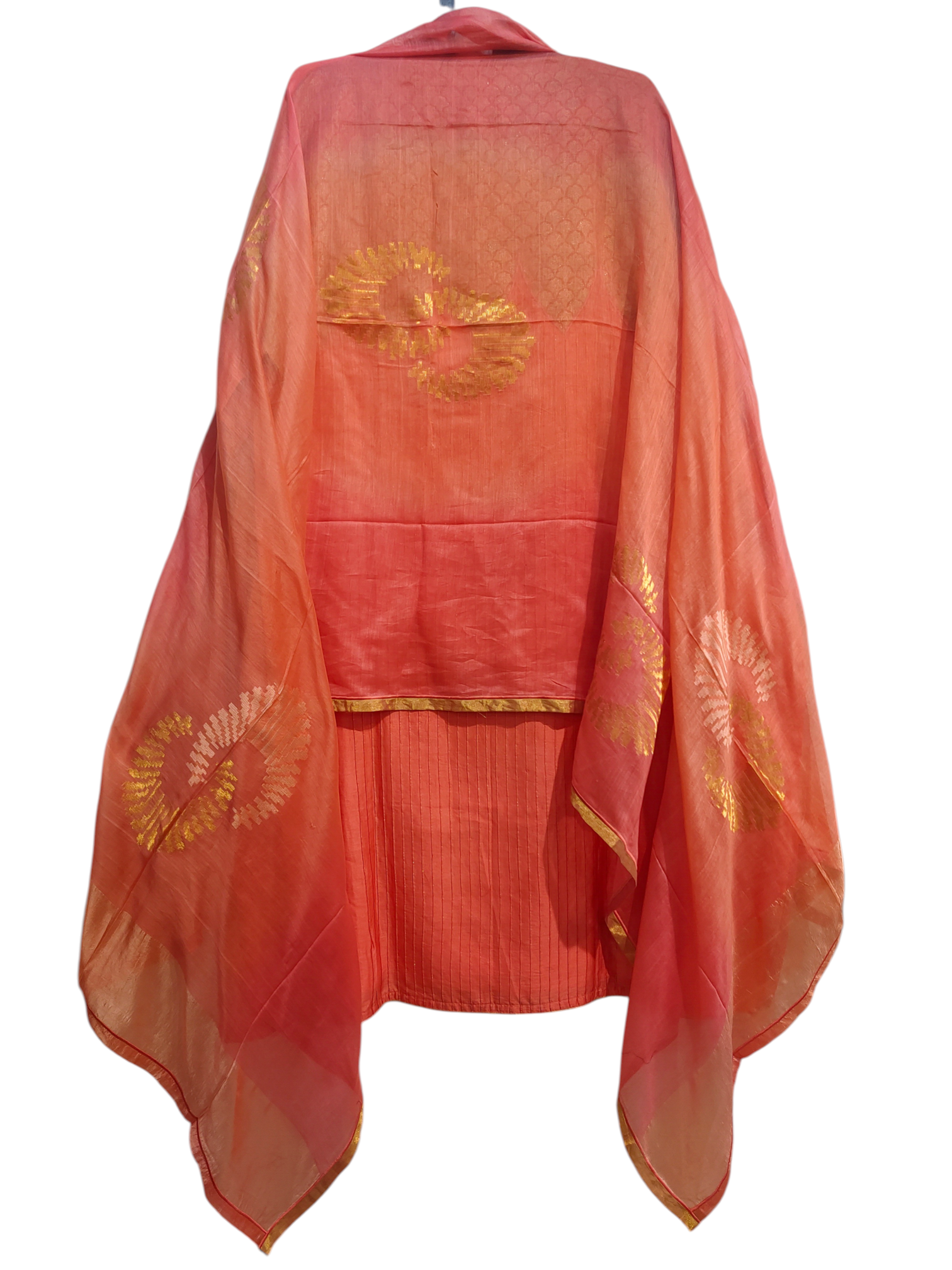 Peach and gold patterns on a white background